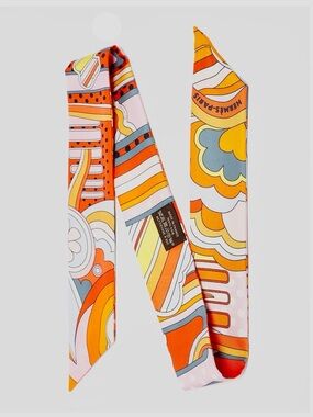 Hermès⎻Orange & White Swirly Floral Twilly Scarf